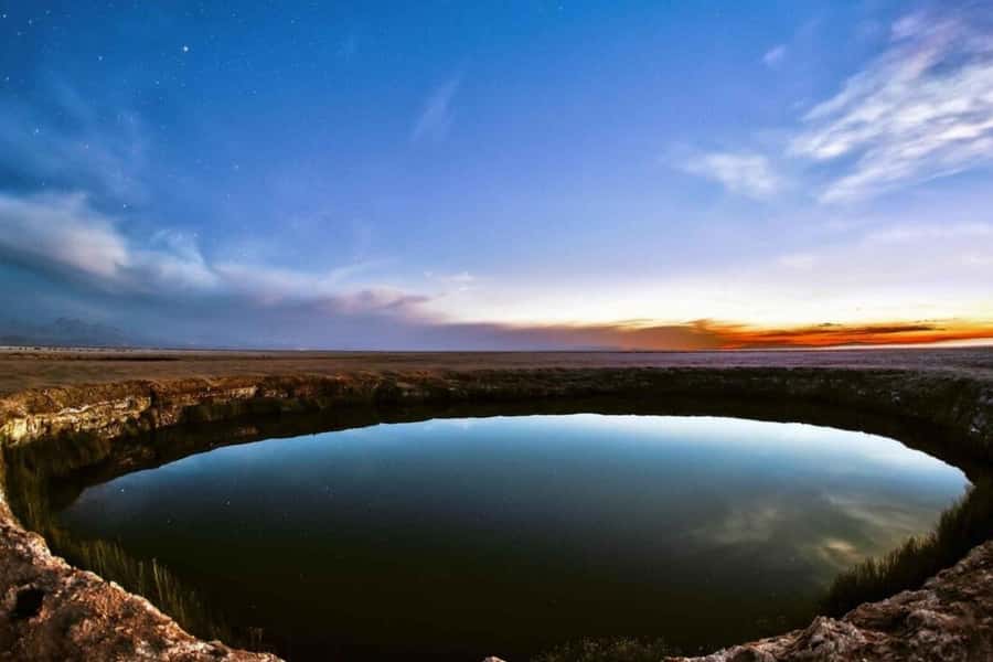 Atacama Desert: Floatation in Laguna Cejar and Sunset - Ojos del Salar, two freshwater eyes in a salt desert