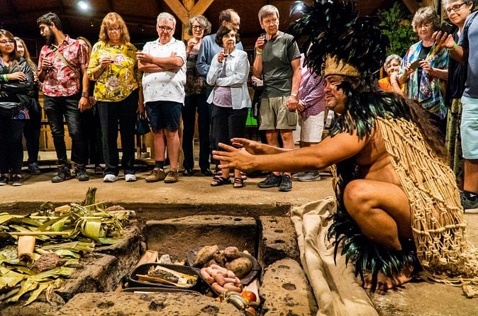 Easter Island Ancestral Dinner and Show with Transport - Seeing the traditional earth oven opened