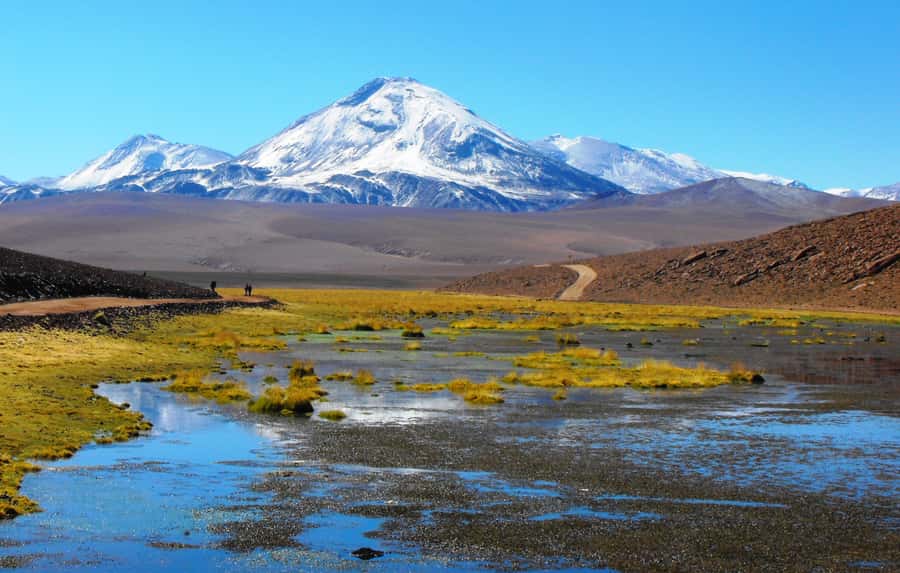 From San Pedro de Atacama: Tatio Geysers and Machuca Tour - Machuca wetlands and a tiny adobe town