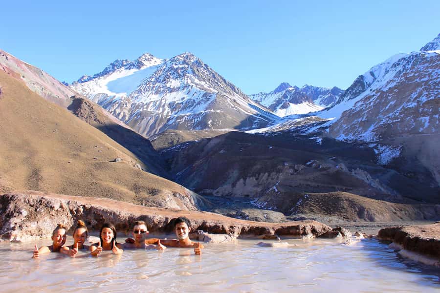 From Santiago: Maipo Canyon Volcano and Hot Spring Tour - A riverside lunch with Chilean wine