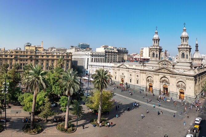 La Moneda Changing of Guard & Historic Santiago Walking Tour - Paseo Nueva York and the old commercial district