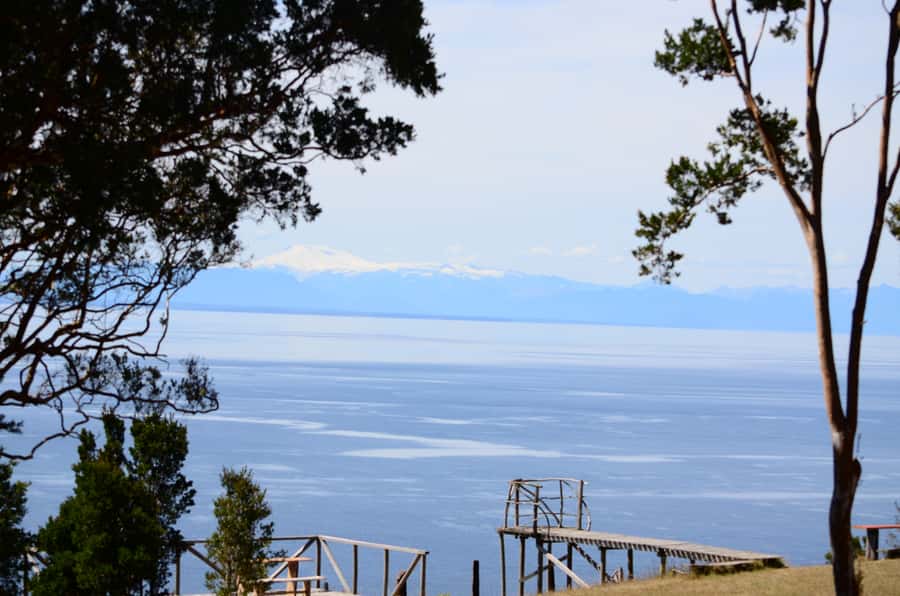 Lemuy Island: Churches and trees in Chiloé. - The five-minute ferry crossing