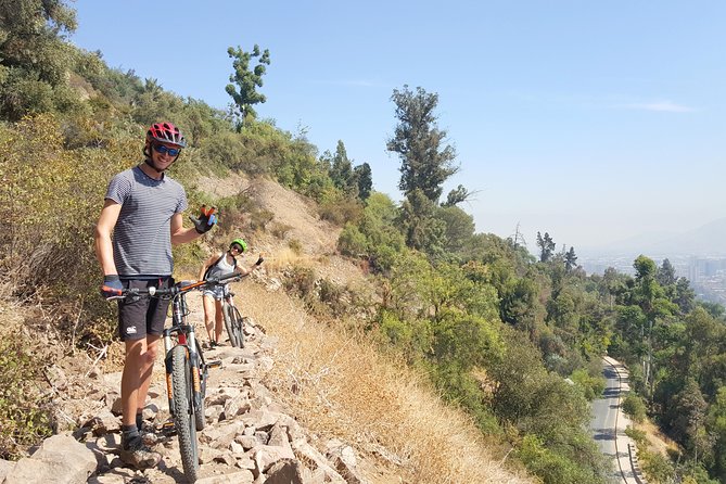 Private San Cristobal Hill Mountain Bike Tour - Exiting toward Vitacura and Bicentennial Park