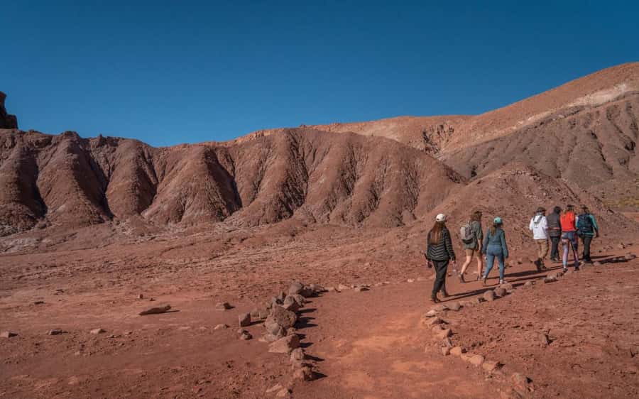 San Pedro de Atacama: Rainbow Valley and Petroglyphs Tour - Hierbas Buenas and the Atacameño carvings