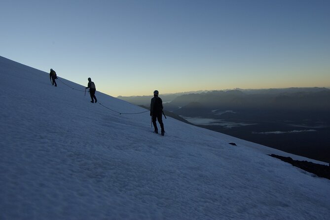 Sunrise Hike up to the Glacier of Osorno Volcano - Sunrise views versus a rough-weather mountain day