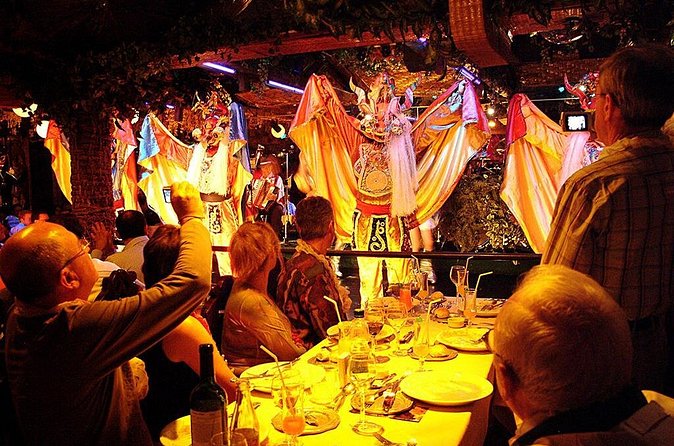 Traditional Chilean Show with Dinner and Private Transportation in Santiago - A setting built around Rapa Nui imagery