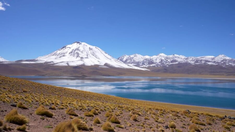 Triple tour: Red stones, highland lagoons and Chaxa Lagoon - Socaire, adobe, and high-altitude life